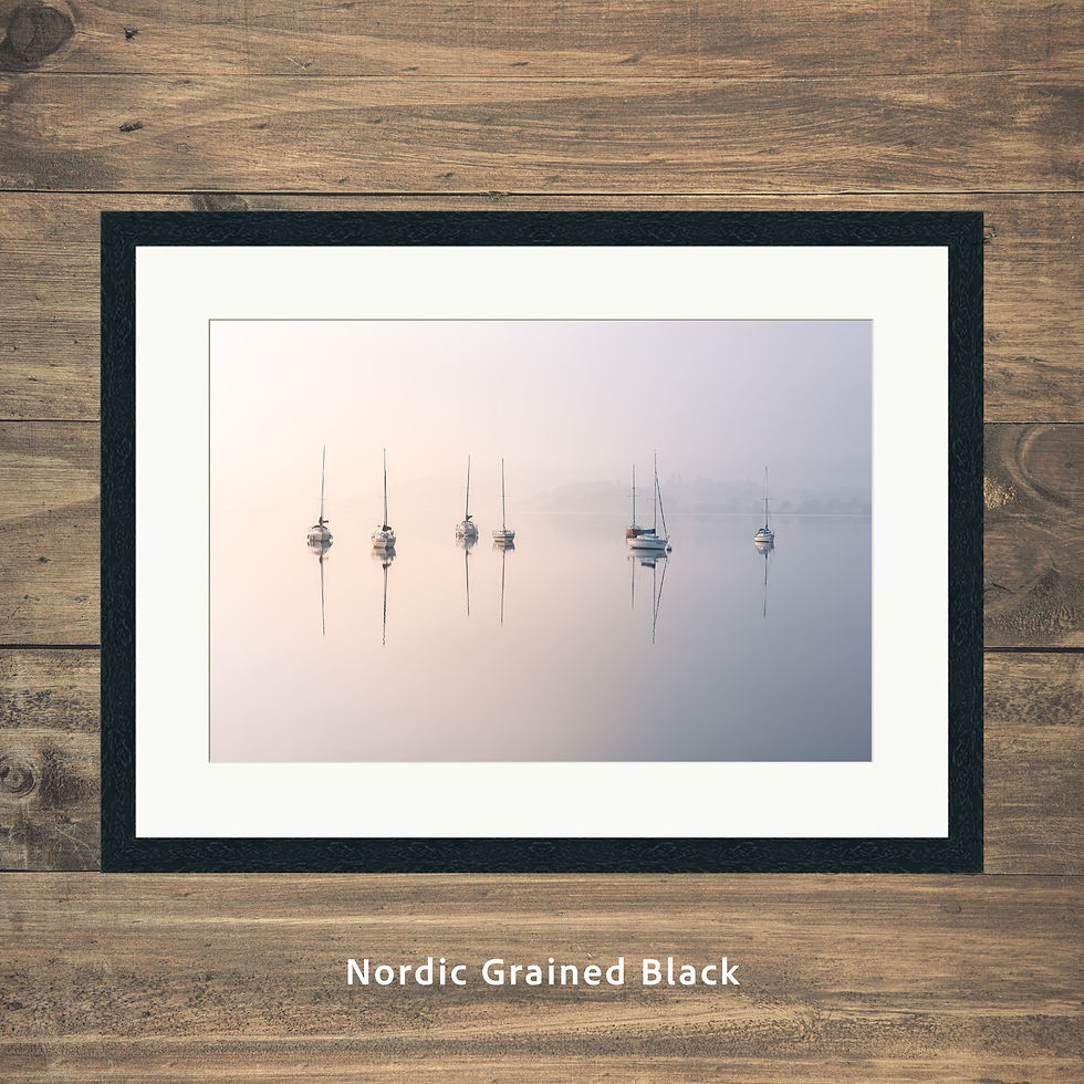 Framed photography prints of a row of yacht boats on a calm and misty morning at Windermere in The Lake District.