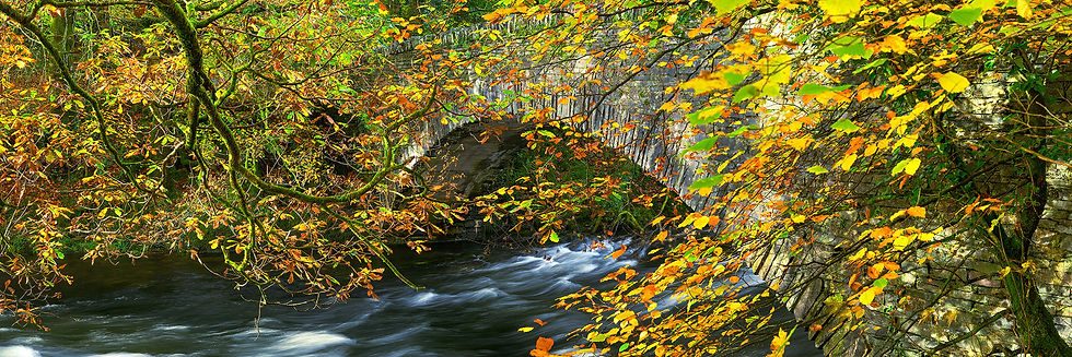 Thumbnail: Panoramic canvas photography prints of the packhorse bridge at Clappersgate in The Lake District, UK.