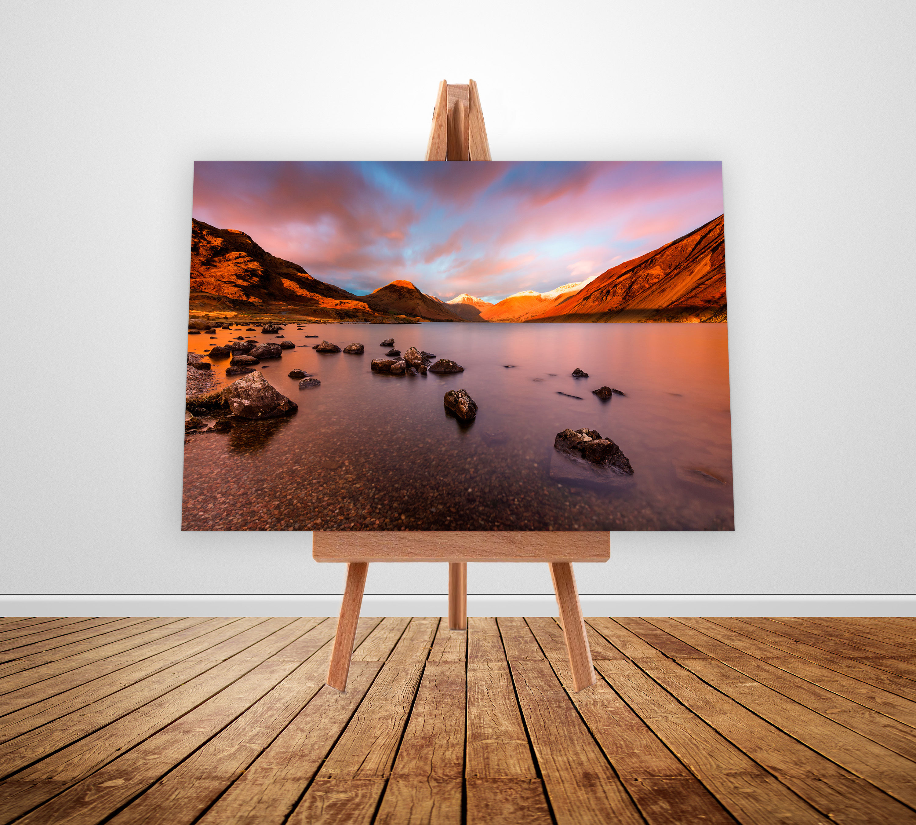 Dramatic views of the iconic viewpoint overlooking Great Gable and Wastwater at sunset in The Lake District, UK.
