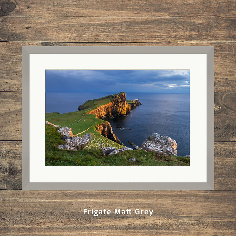 Thumbnail: Beautiful golden evening sunlight on dramatic cliffs of Neist Point with dark blue clouds in sky. Isle of Skye, Scotland.