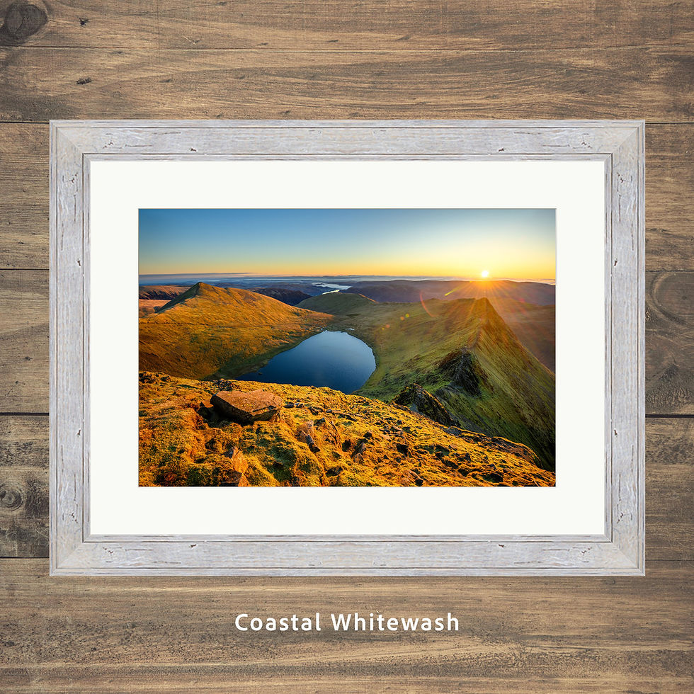 Thumbnail: Framed photography prints of a golden dramatic sunrise overlooking Striding Edge, seen from Helvellyn in The Lake District.