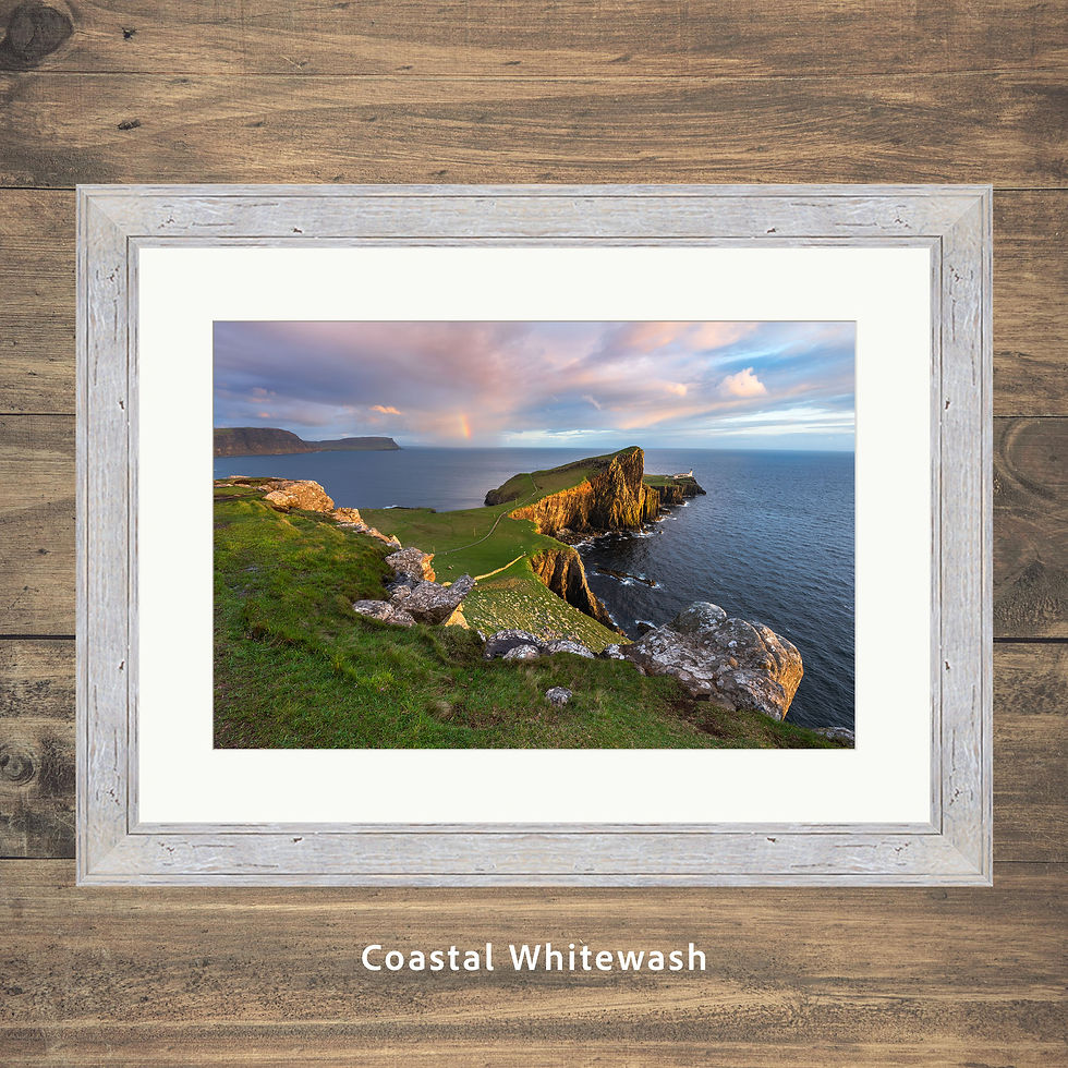 Framed coastal picture of Neist Point Lighthouse on The Isle of Skye, Scotland, UK. Taken in the evening with golden light.