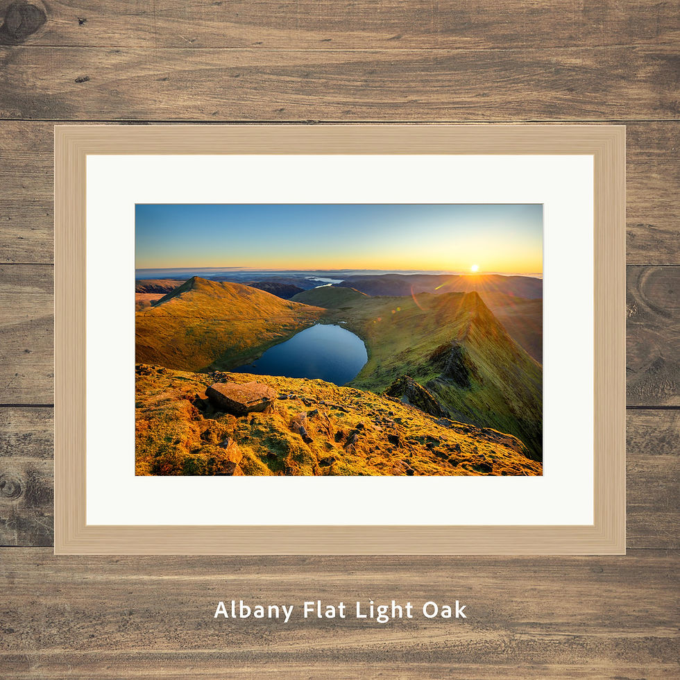 Thumbnail: Framed photography prints of a golden dramatic sunrise overlooking Striding Edge, seen from Helvellyn in The Lake District.