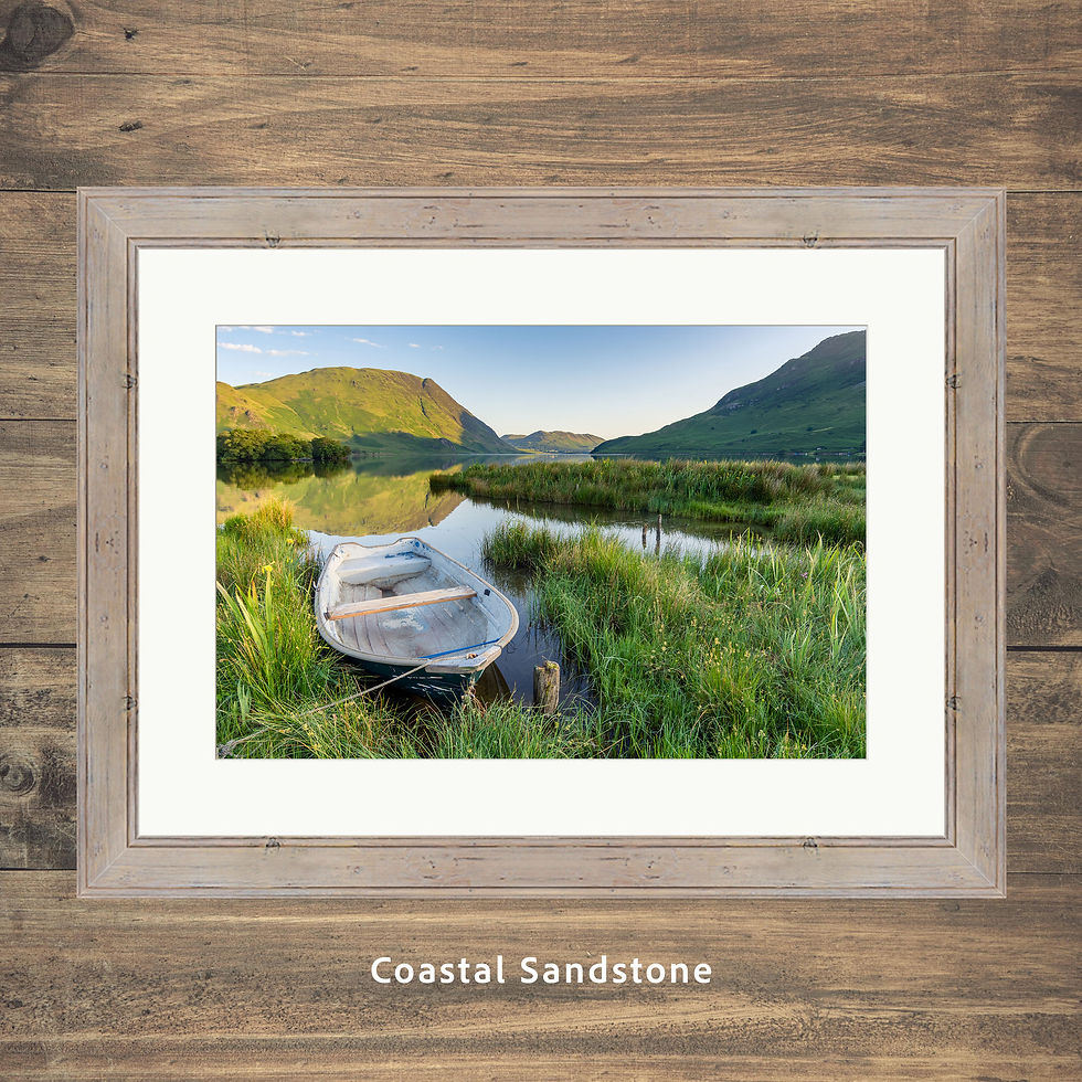 Thumbnail: Framed photography picture prints of a summer view of Crummock Water with an abandoned rowing boat in The Lake District, UK.