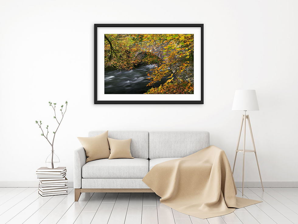 Thumbnail: Photography prints of beautiful autumn colours surrounding the packhorse bridge at Clappersgate in The Lake District, UK.