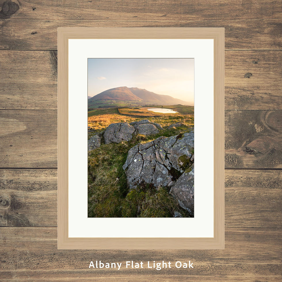 Framed prints of a golden spring morning at Tewet Tarn with picturesque views of Blencathra, Lake District, UK.
