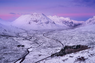 Winter wonderland at Glencoe seen from Beinn a'Chrulaiste in the Scottish Highlands, UK.