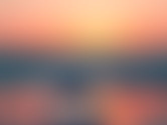Crystal bowl on beach reverberating the sunset