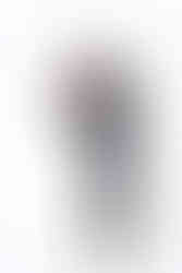 Man in plaid blazer and gray pants excitedly looks at smartphone on white background. Casual style, joyful expression. Viewpoint Photography