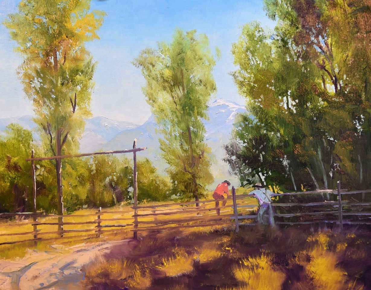 An oil painting of ranch-hands lingering on a fence with fall trees providing shade and distant mountains with snowcapped peaks by Master American painter Michael Ome Untiedt.