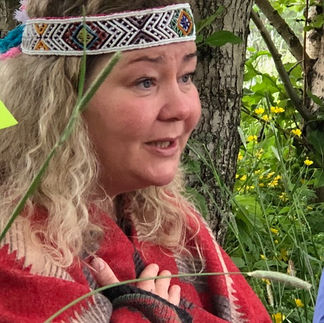 A photograph of Bijork Does Fire Ceremony during a Women's Quest Adventure and Retreat in Iceland.
