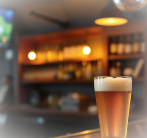 bar top with pint of beer and soft yellow lighting_edited_edited.jpg