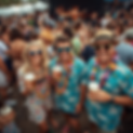 Realistic photo of a crowd of people dressed in beach theme costumes sampling beers, smili