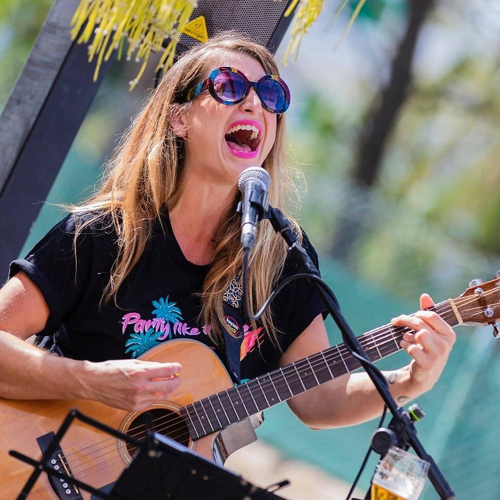Singing at a local festival in San Antonio