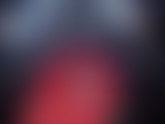 A lamp surrounded by red carpet and paparazzi