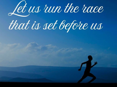 Silouette of person jogging, clouds clear, deep blue skies in background