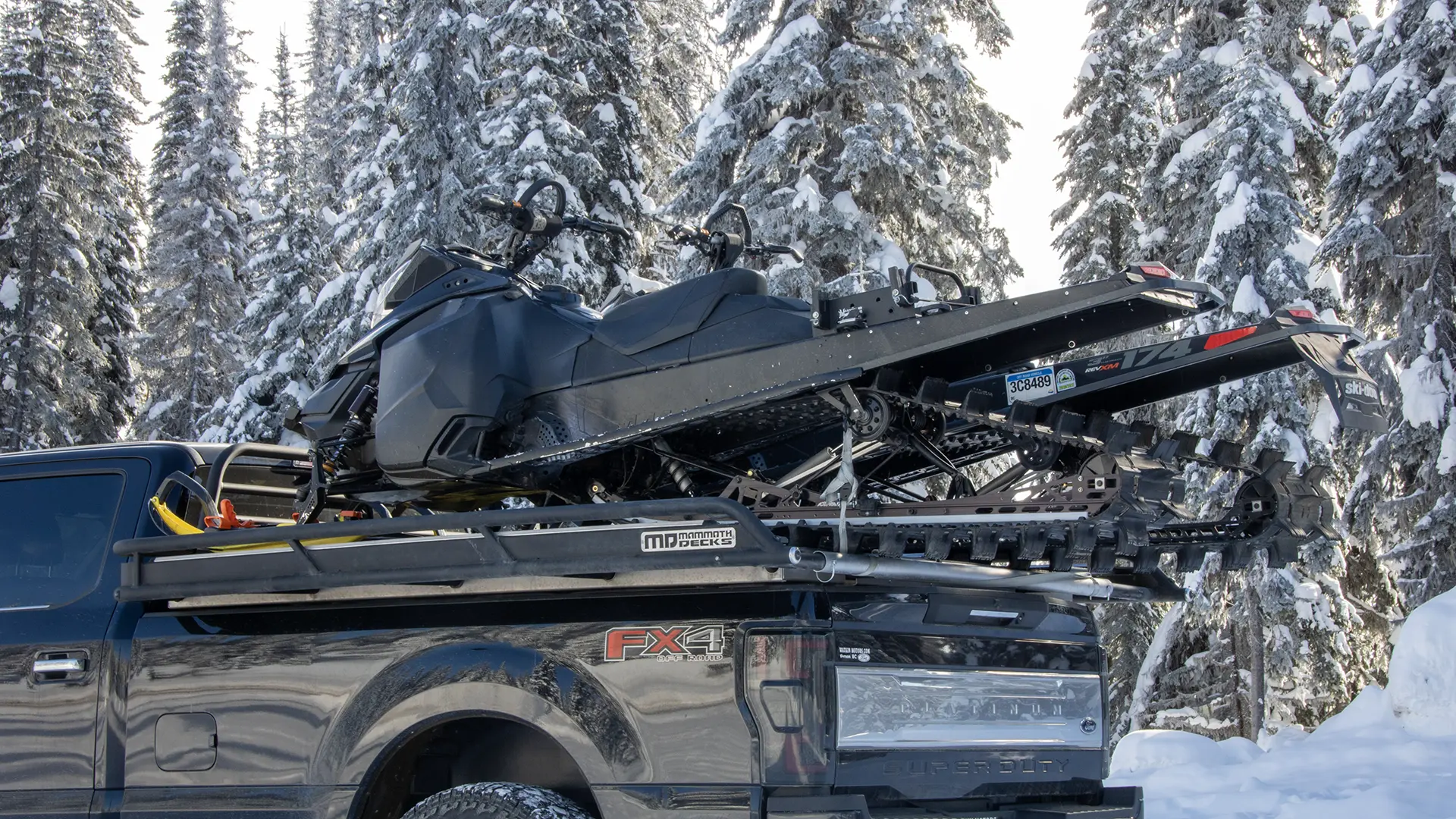 Elevate your truck's versatility with the MULTY® Sled Deck. This North American-made aluminum deck boasts a PolyBoard® composite decking for long-lasting durability. With telescoping slide-outs and a range of LED lights, it's designed for convenience and safety. The UHMW bushings on moving parts ensure smooth operation. What's more, this deck doesn't require permanent installation, and its adjustable legs accommodate various truck models. Equipped with a 10-1/2’ telescoping ramp and L-Track for cargo security, the MULTY® Sled Deck offers unmatched versatility for work and play
