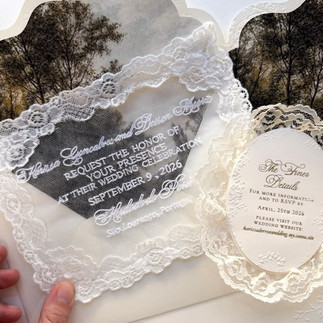 Lace wedding invitations in a photo lined envelope inlay for an old-era wedding.
