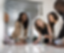 Black woman in meeting.png