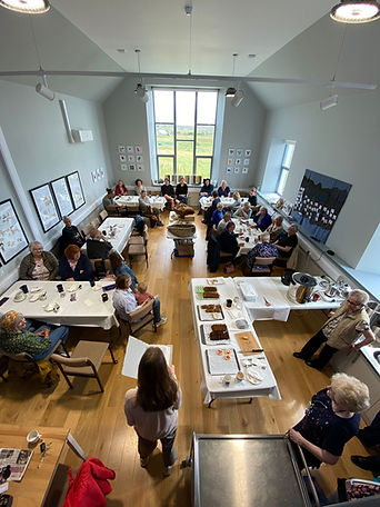 Ginneabhat Community Room full of people