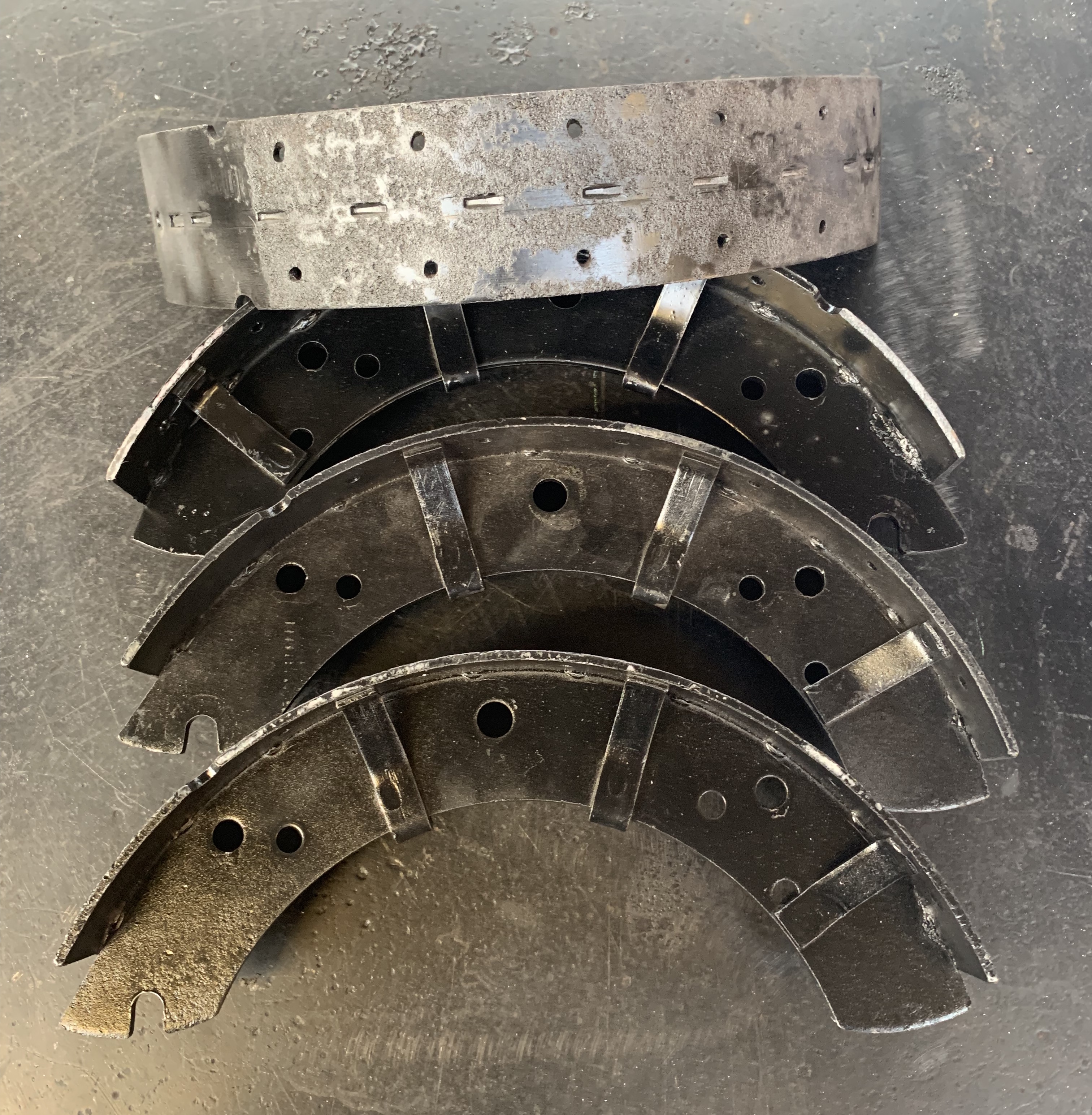 A set of racing brake shoes ready