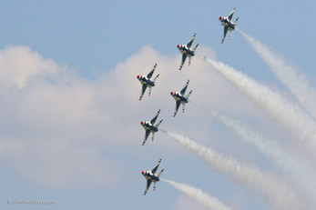The Thunderbirds fly in a formation at EAA in Oshkosh, WI. sports, action, events, photography, photojournalism, Wisconsin, Oshkosh, EAA, jets, airplanes, F-16, Falcons, US Air Force,