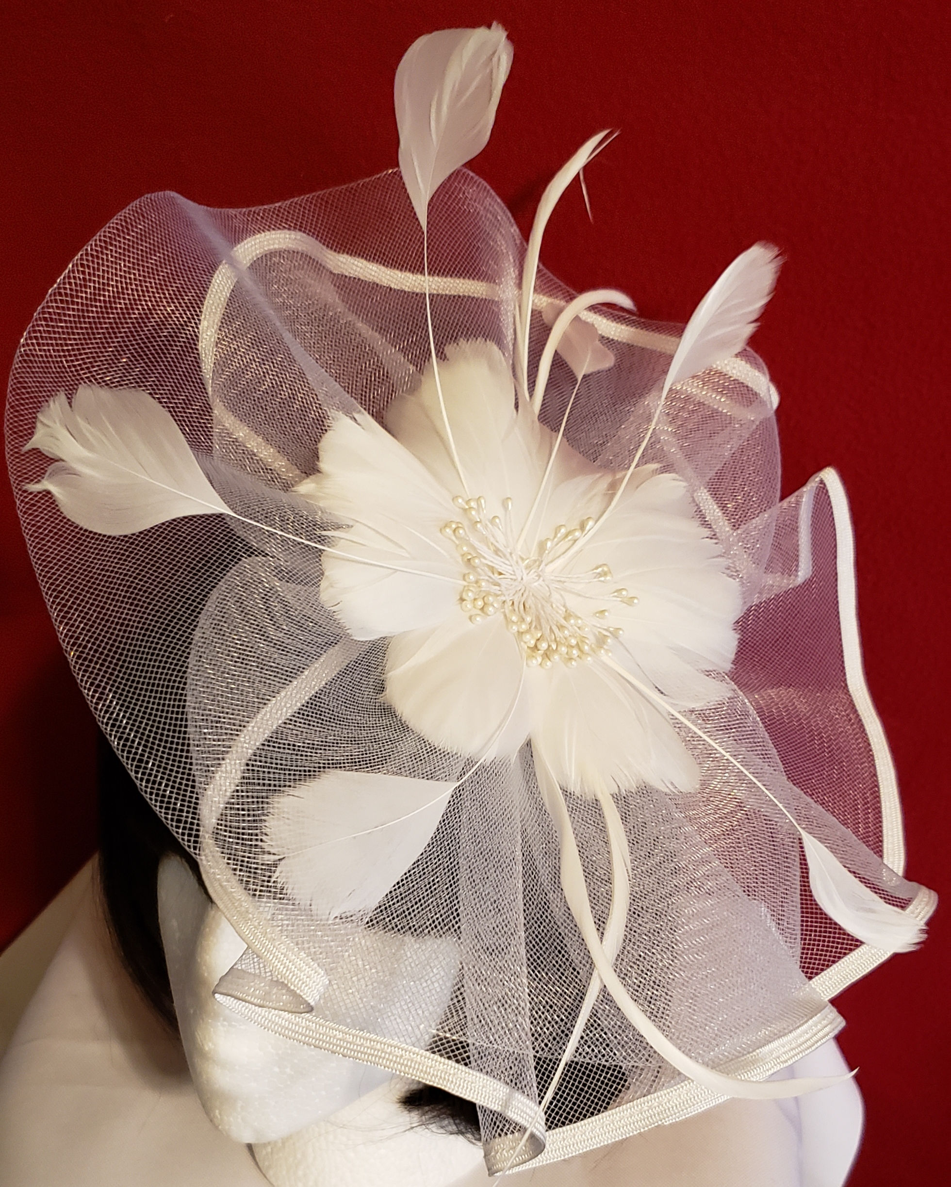 White flower fascinator w/ feathers