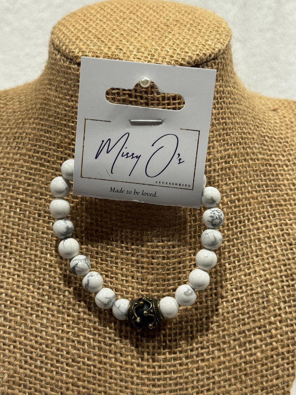 White marbled bracelet w/ crowns & black