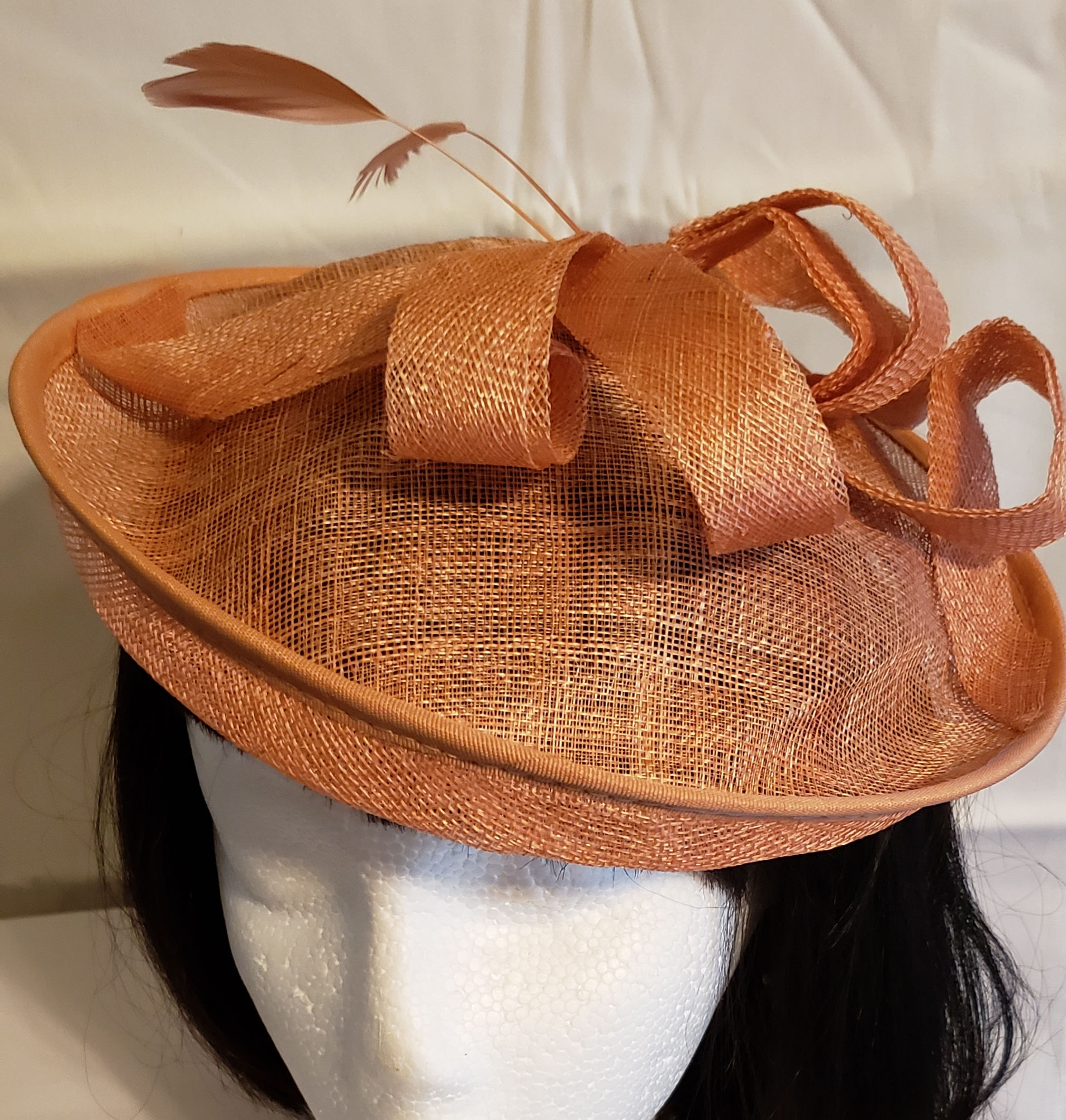 Brown fascinator w/ bows feathers
