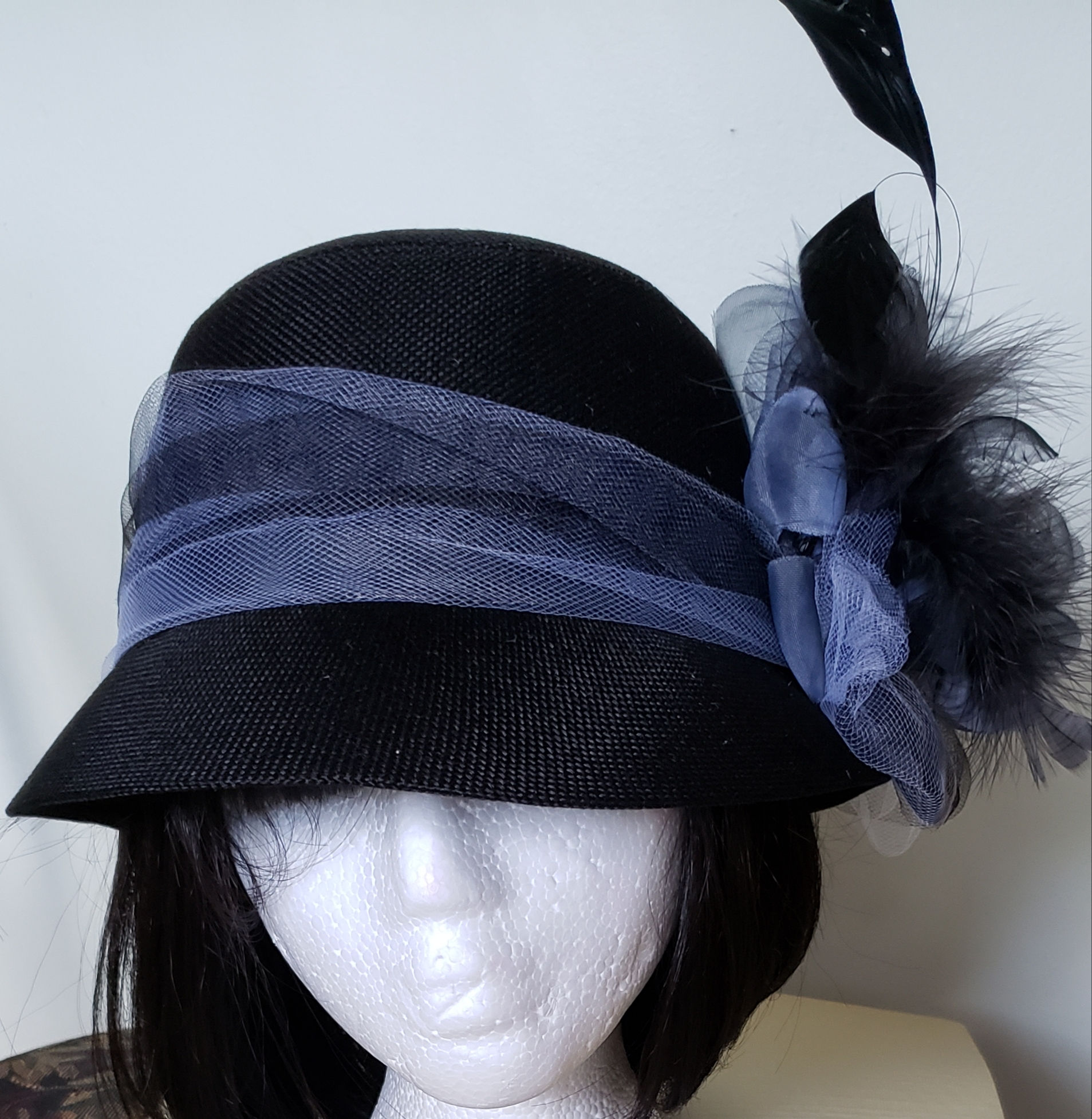 Black hat w/ blue flower and feather