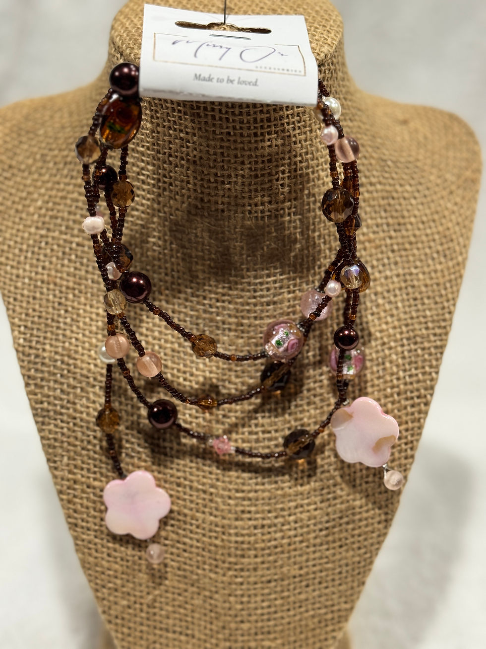 Dark brown long open necklace w/ pink mother-of-pearl