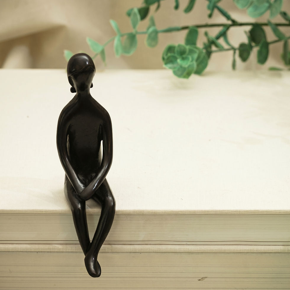 Thumbnail: 'Patience girl' bronze sculpture by Jennifer Troice - a small seated girl waiting patiently