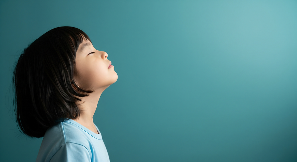 Child in profile, eyes closed, likely during developmental assessment