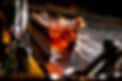 cocktail-glass-with-ice-cubes-garnished-with-dried-lemon-fruit.jpg