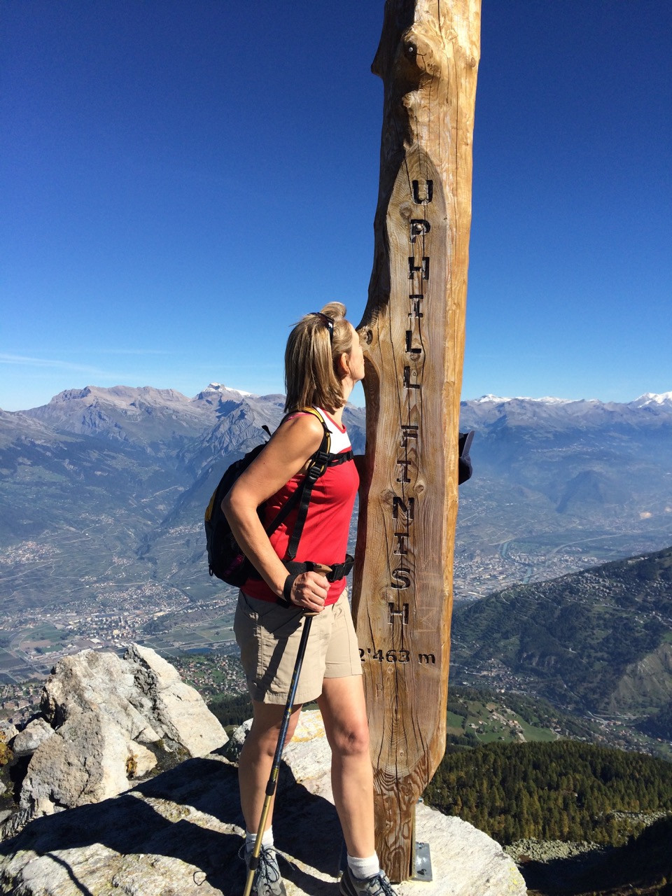 Yoga Teacher Yogawithvickib hiking to top of Swiss Mountain