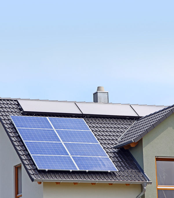 A Photograph of a solar panel on the roo