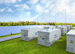 a wind site with battery storage in the background