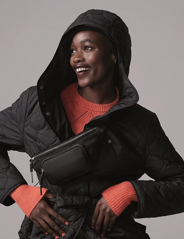 woman wearing a quilted coat