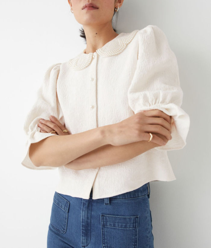 woman wearing a white blouse