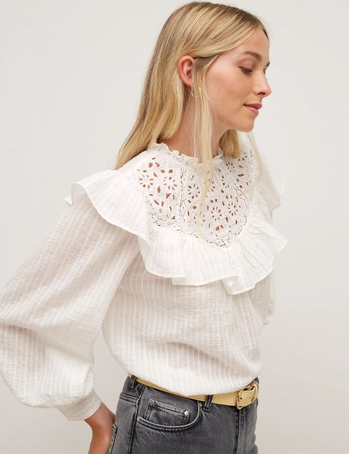 woman wearing a frill top 