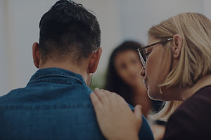 Shot of a counsellor consoling a client