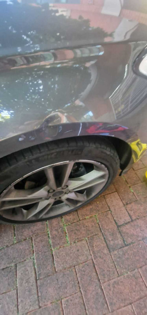 dent on silver car