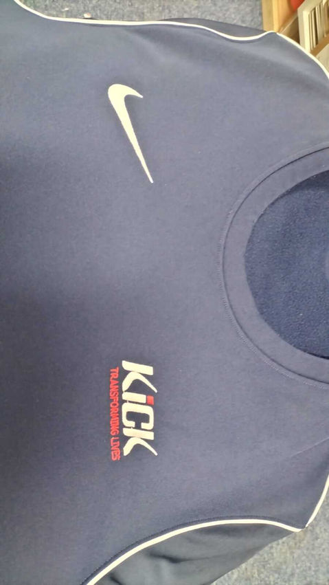 Navy shirt with embroidered circular crest