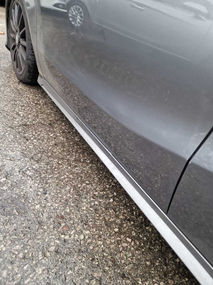 side of silver car