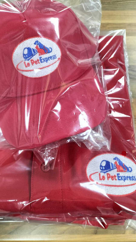 Red shirts with white staff badges for event

