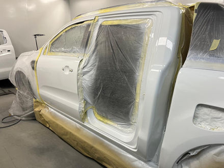 car paint on white car door