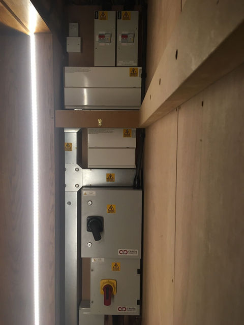 Tall domestic boiler installation in cupboard space