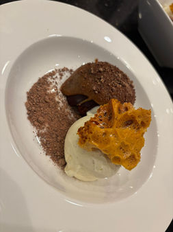 Chocolate dessert with ice cream and honeycomb