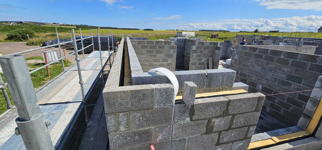 new build house under construction by Darmark Home Construction Ltd