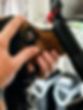 Veterinarian examining a dog's eye during a checkup.
